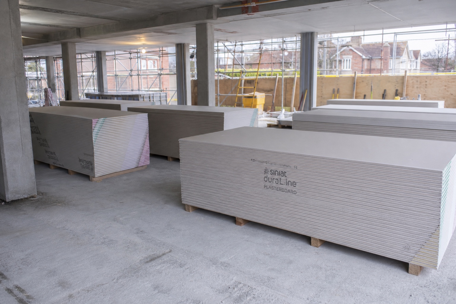 Plasterboard installation on a West Bromwich construction site
